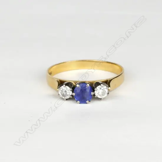 An 18ct.gold sapphire and diamond ring