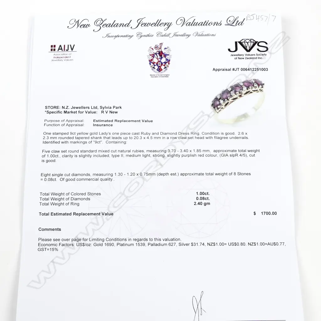 A 9ct gold ruby and diamond ring Image 1++