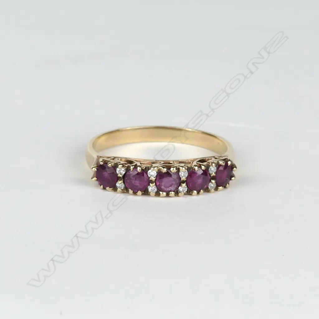A 9ct gold ruby and diamond ring Image 1++