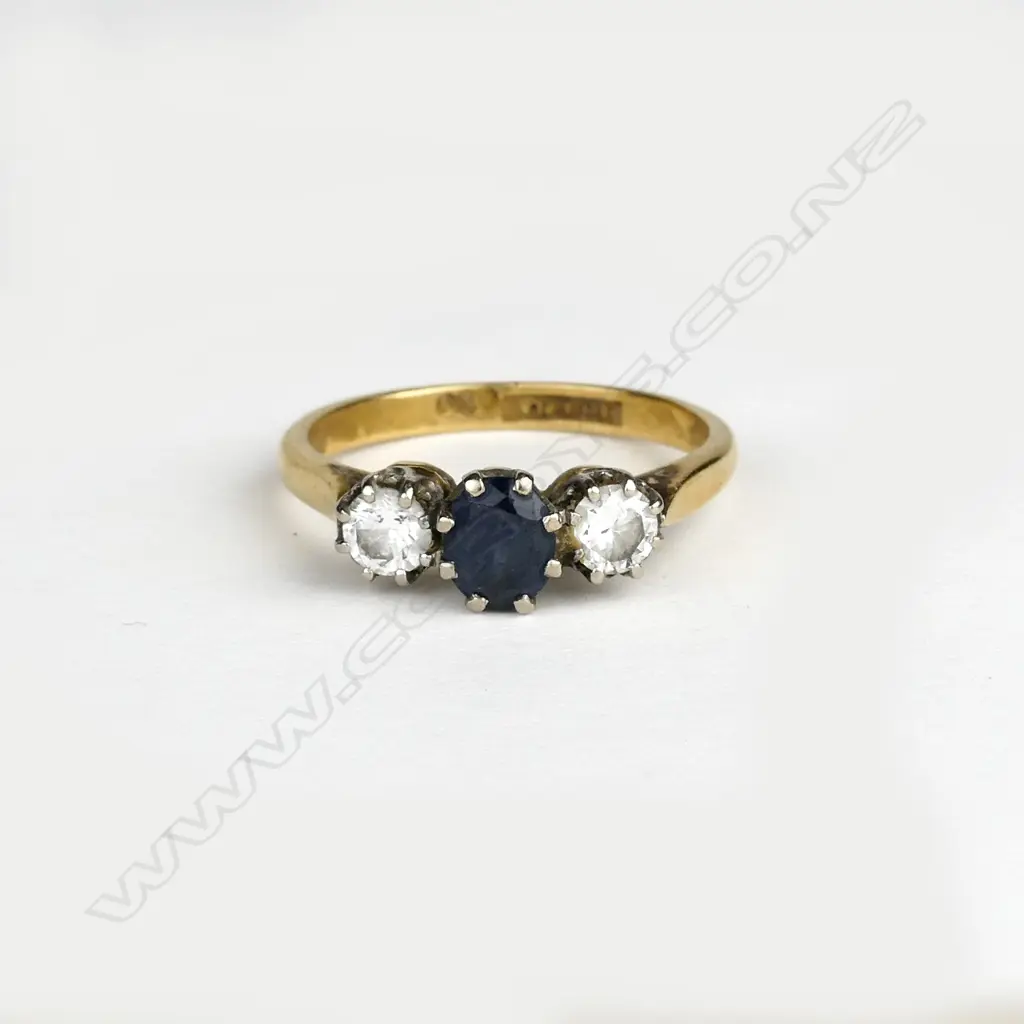 An 18ct. gold sapphire and diamond ring Image 1++