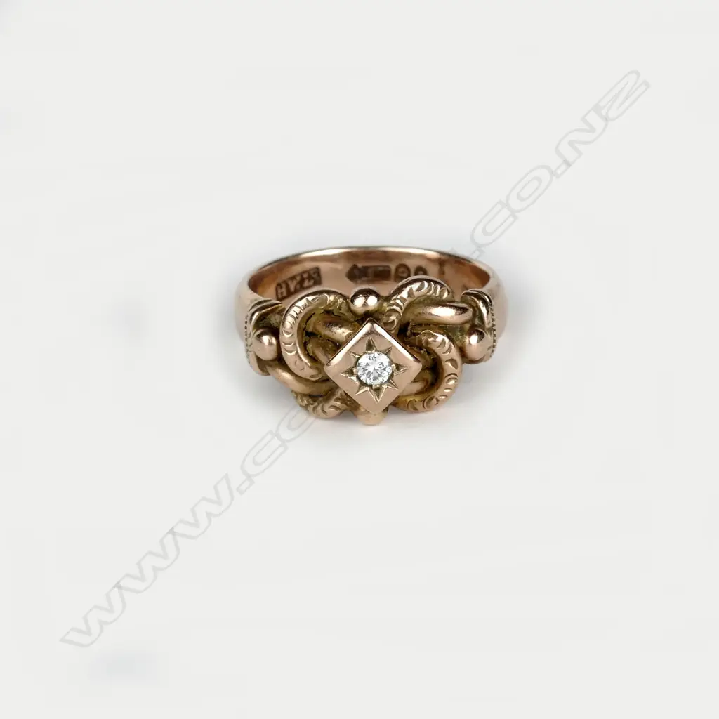 A 9ct. rose gold and diamond ring Image 1++