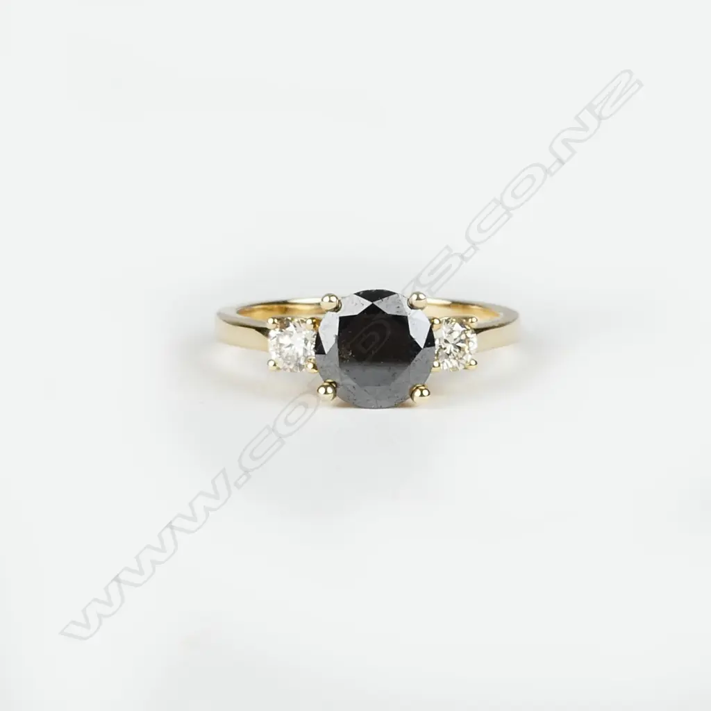 A 14ct. yellow gold diamond trilogy ring Image 1++