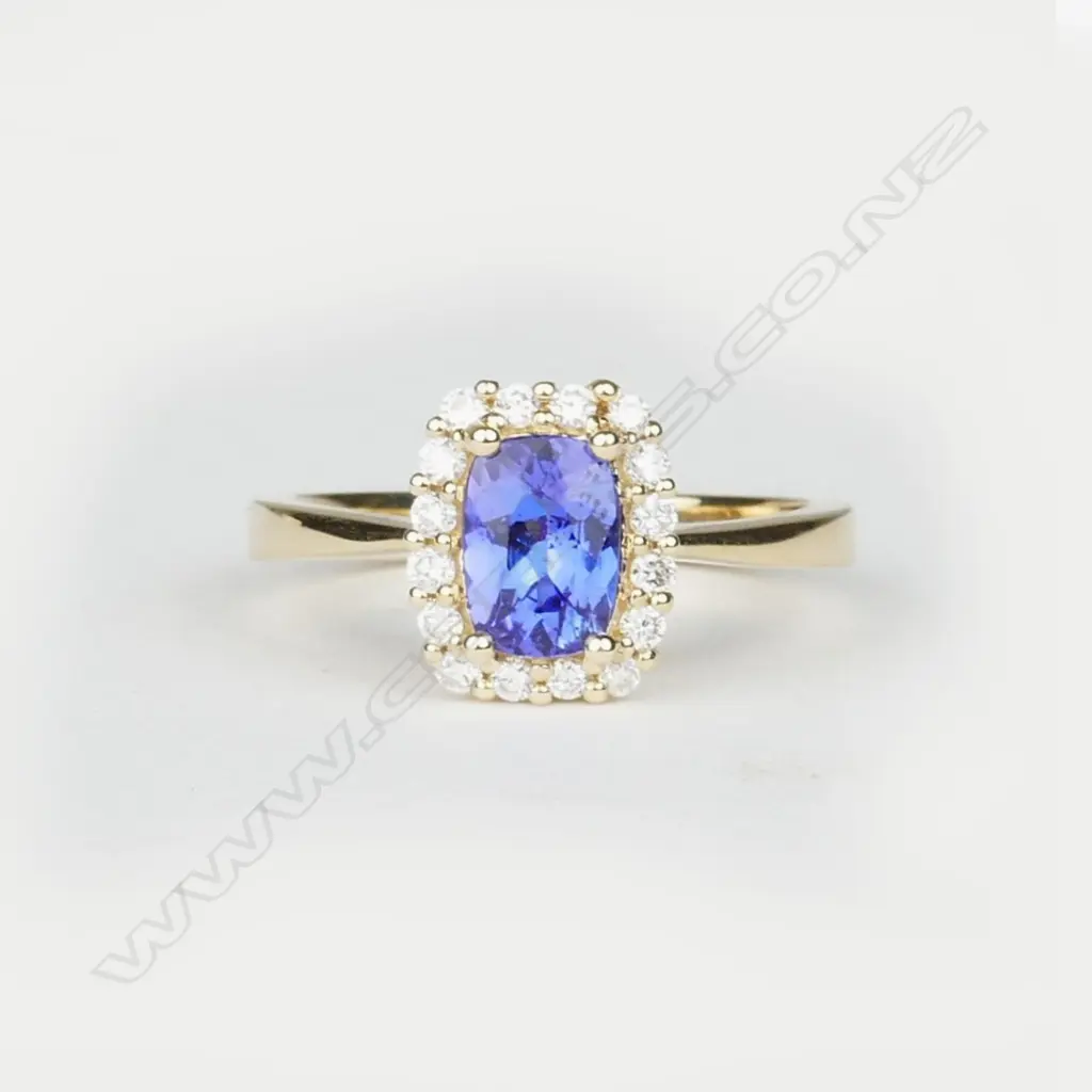 A 14ct. yellow gold tanzanite and diamond ring Image 1++
