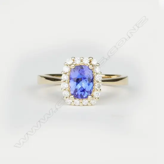 A 14ct. yellow gold tanzanite and diamond ring