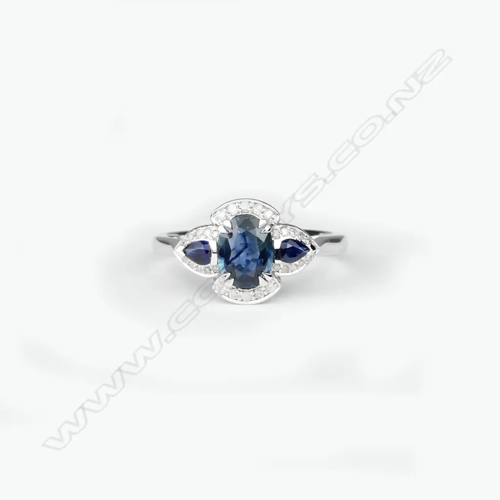 A 14ct. white gold sapphire and diamond ring Image 1++