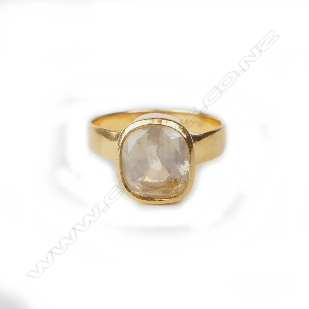 An estate 22ct. yellow gold and yellow sapphire ring Image 1++