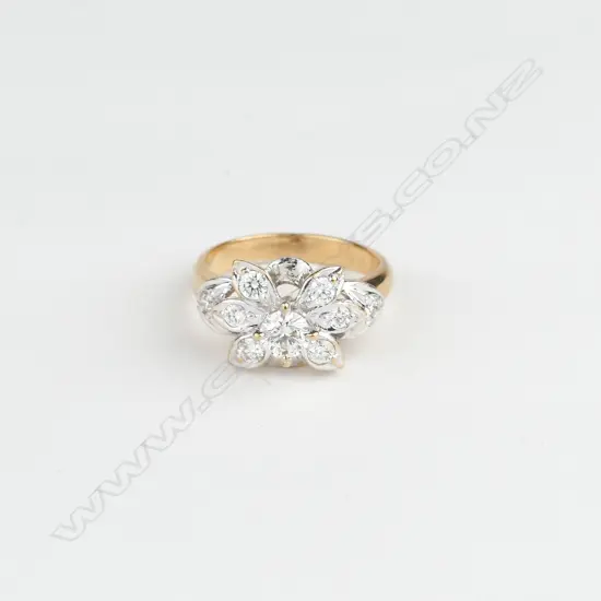 An 14ct gold and diamond cluster ring
