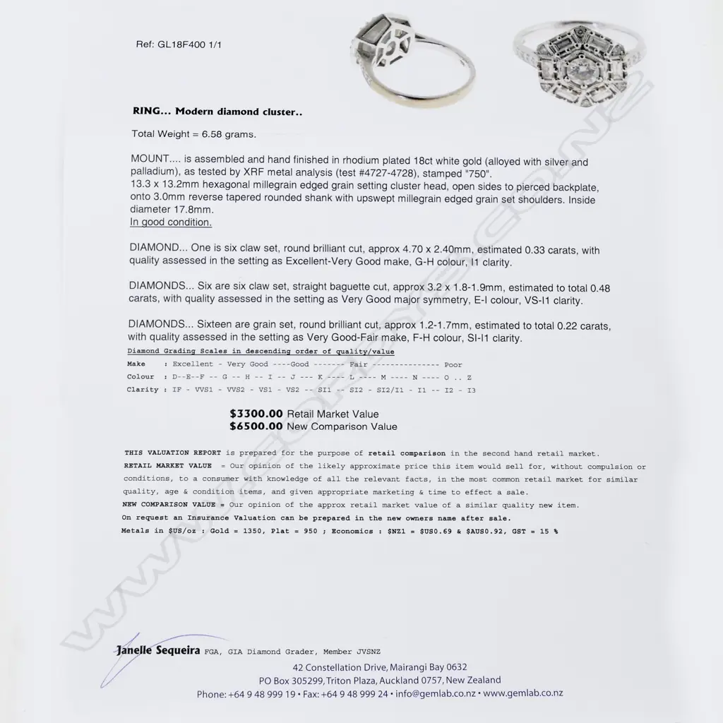 An 18ct. white gold and diamond ring Image 1++