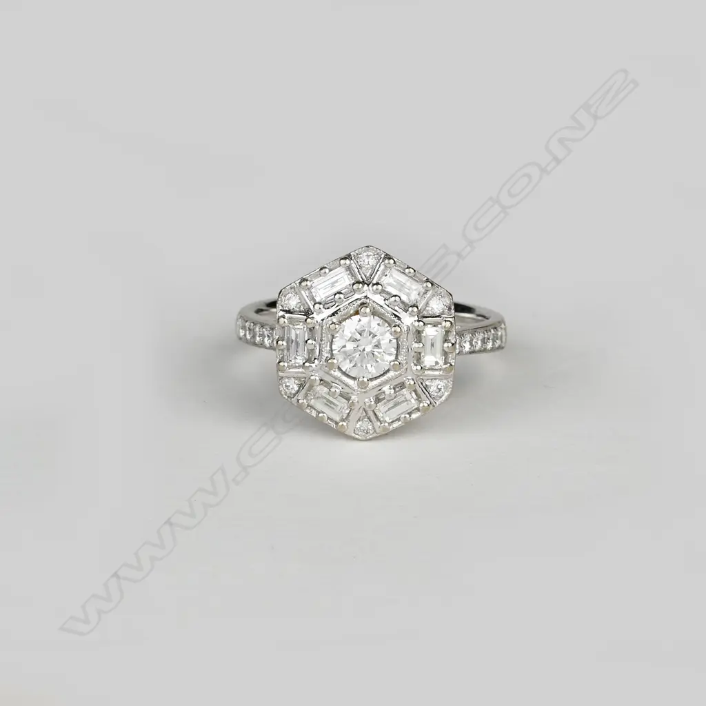 An 18ct. white gold and diamond ring Image 1++