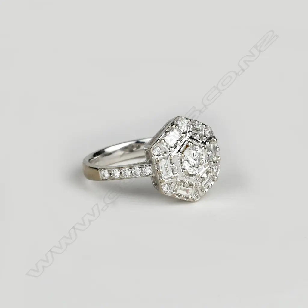 An 18ct. white gold and diamond ring Image 1++