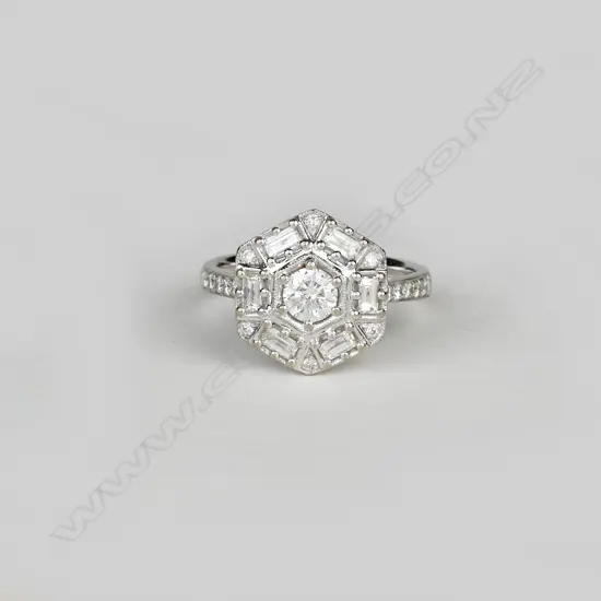 An 18ct. white gold and diamond ring