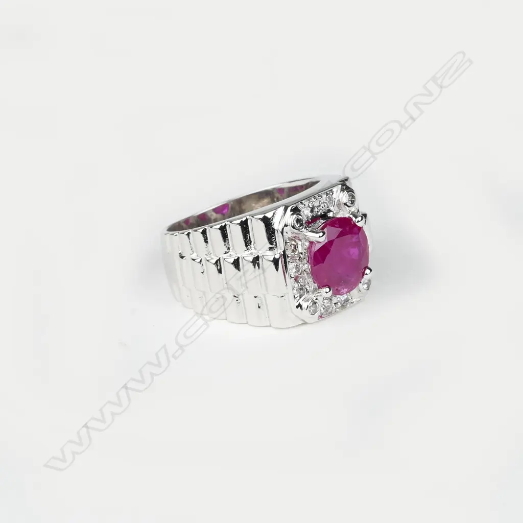 A 14ct. white gold ruby and diamond gent's ring Image 1++