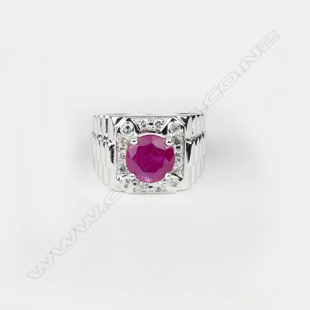 A 14ct. white gold ruby and diamond gent's ring Image 1++