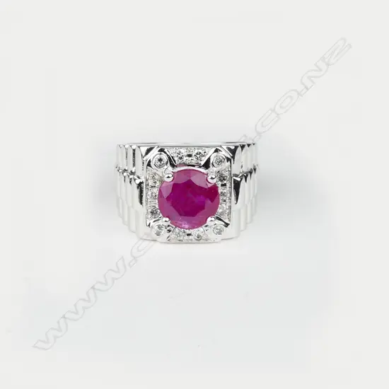 A 14ct. white gold ruby and diamond gent's ring