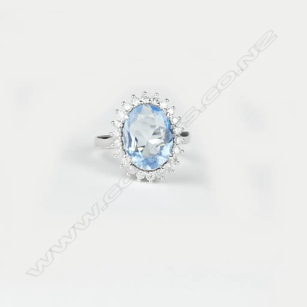 A 14ct. white gold aquamarine and diamond ring Image 1++