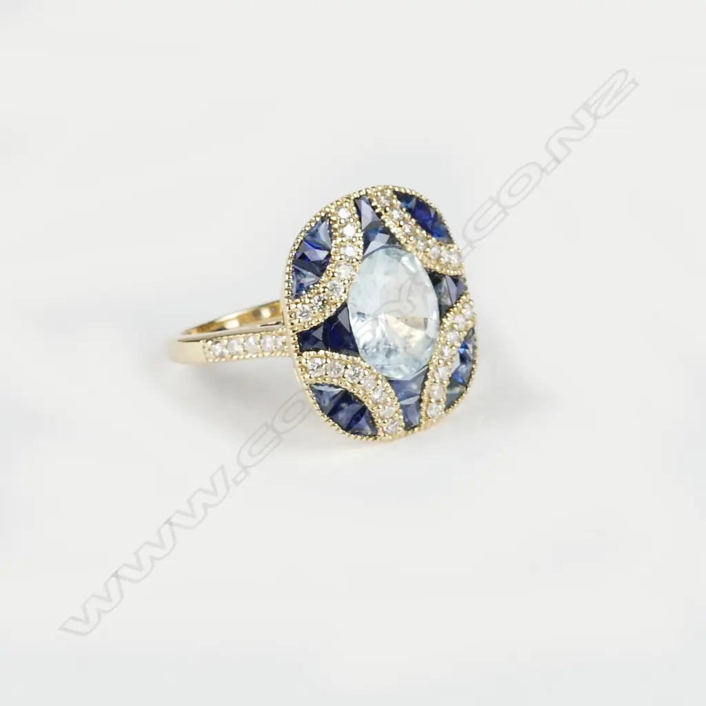 A 14ct. yellow gold aquamarine sapphire and diamond Art Deco style ring Image 1++