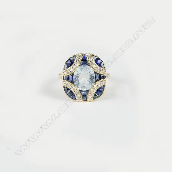 A 14ct. yellow gold aquamarine sapphire and diamond Art Deco style ring
