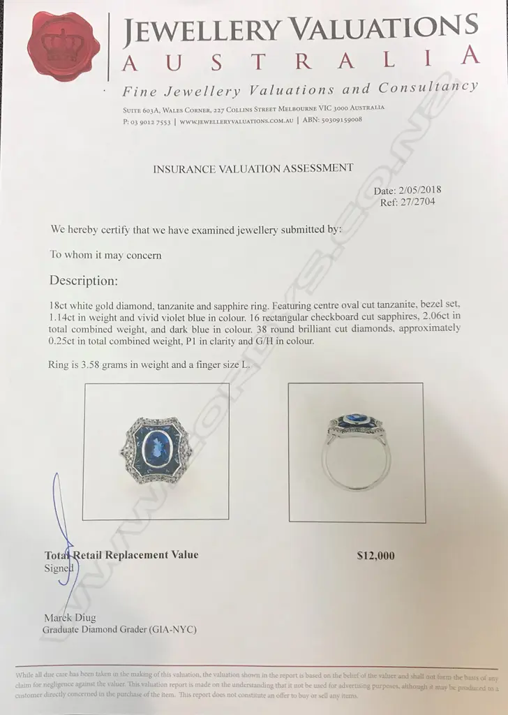 An 18ct. white gold tanzanite sapphire and diamond ring Image 1++