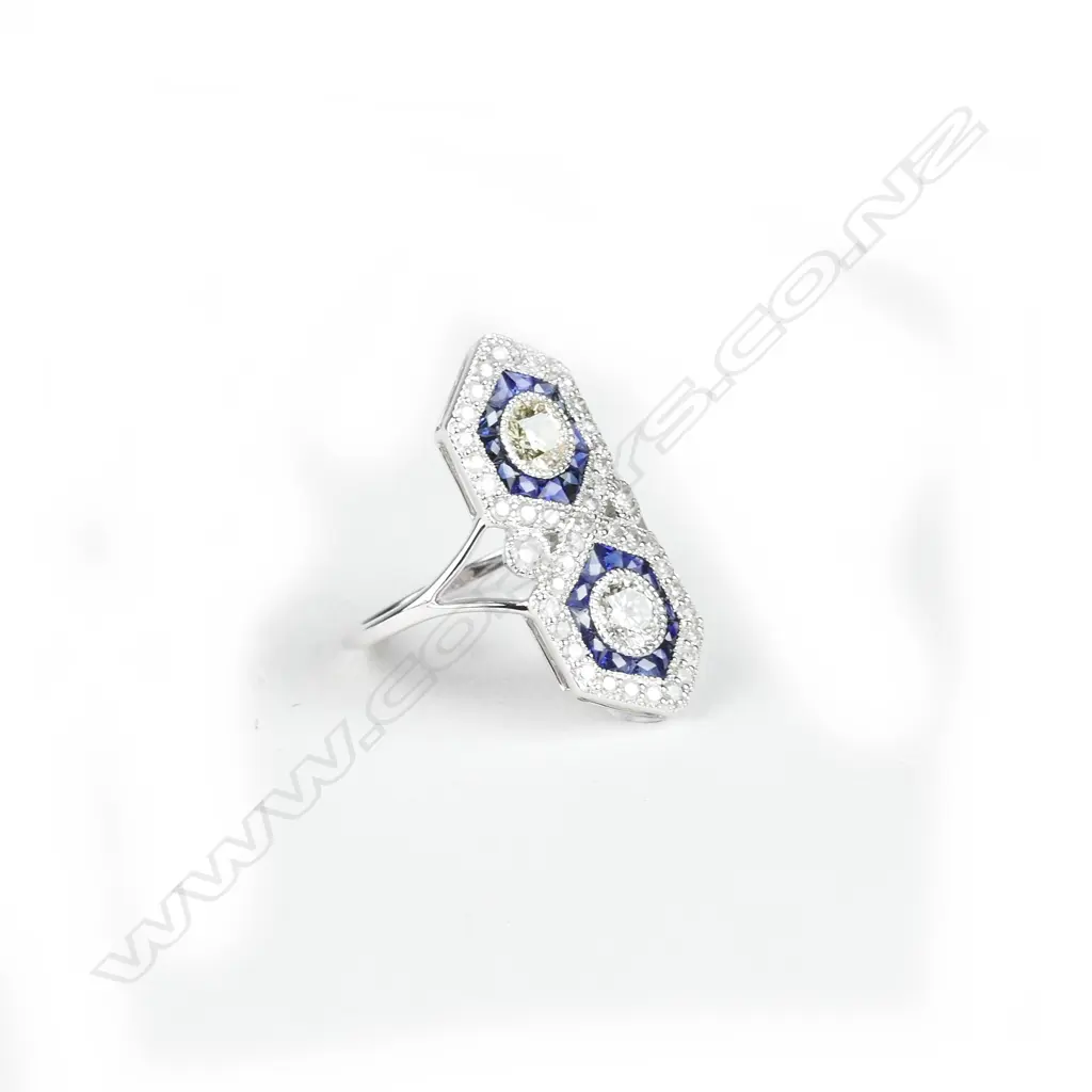 An 18ct. white gold diamond and sapphire art Deco style ring Image 1++