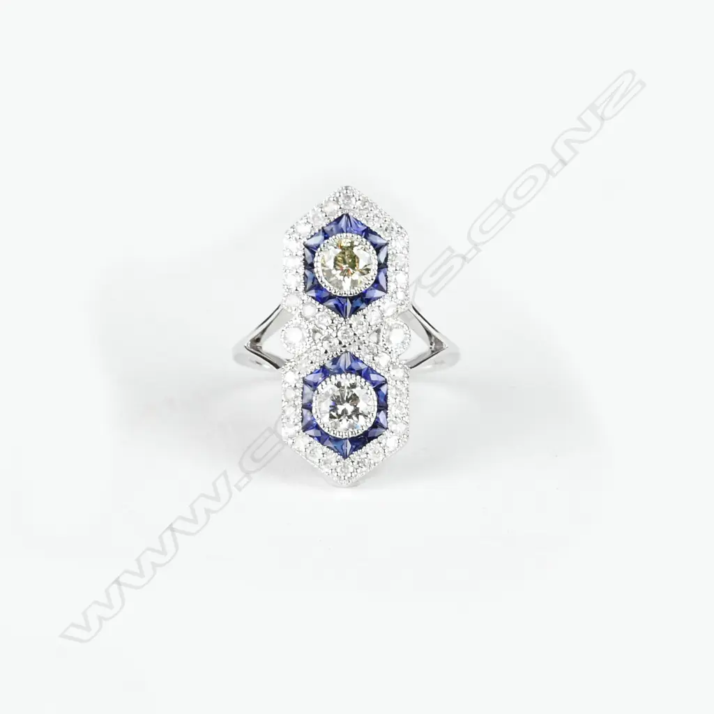 An 18ct. white gold diamond and sapphire art Deco style ring Image 1++