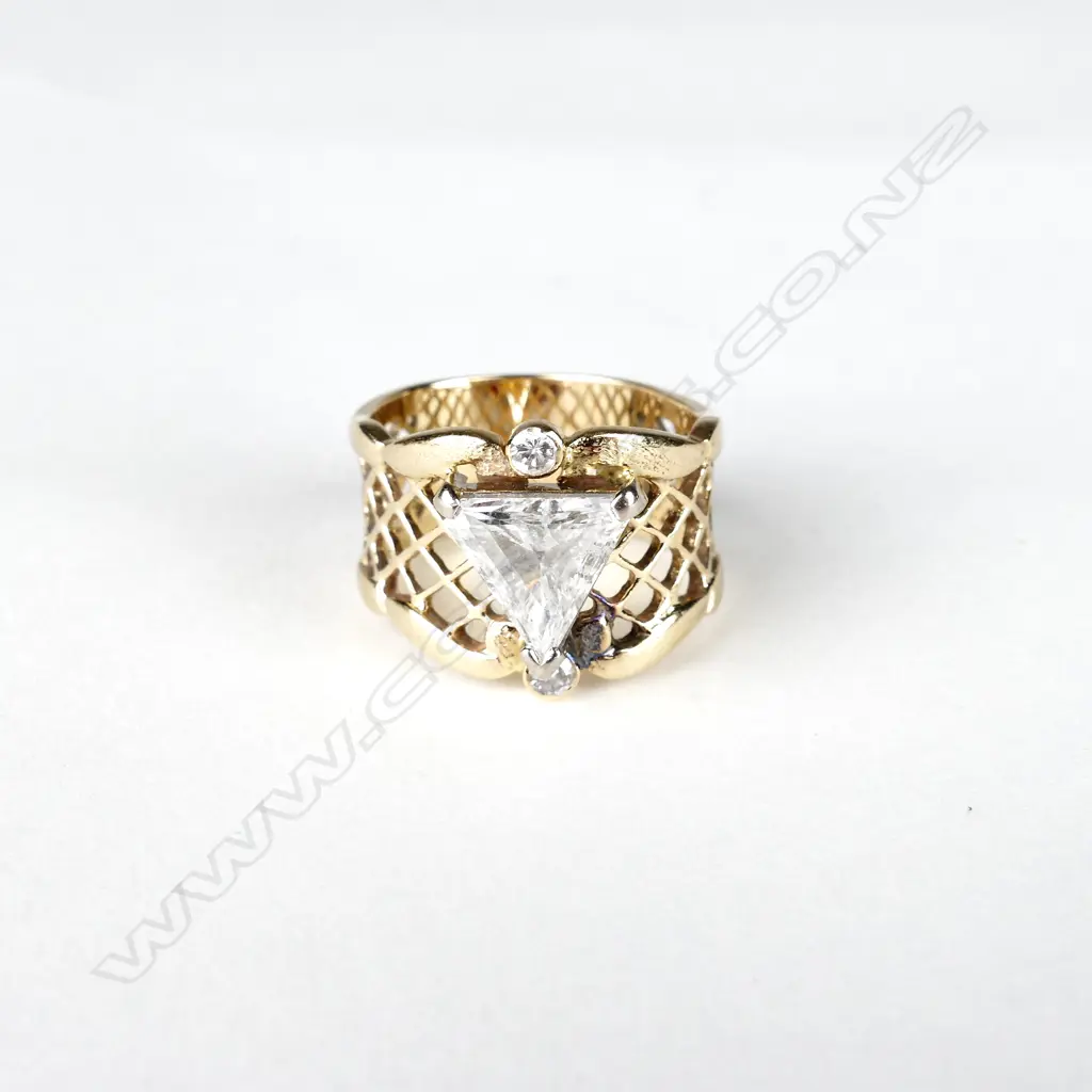 A 14ct gold and diamond solitaire ring Image 1++