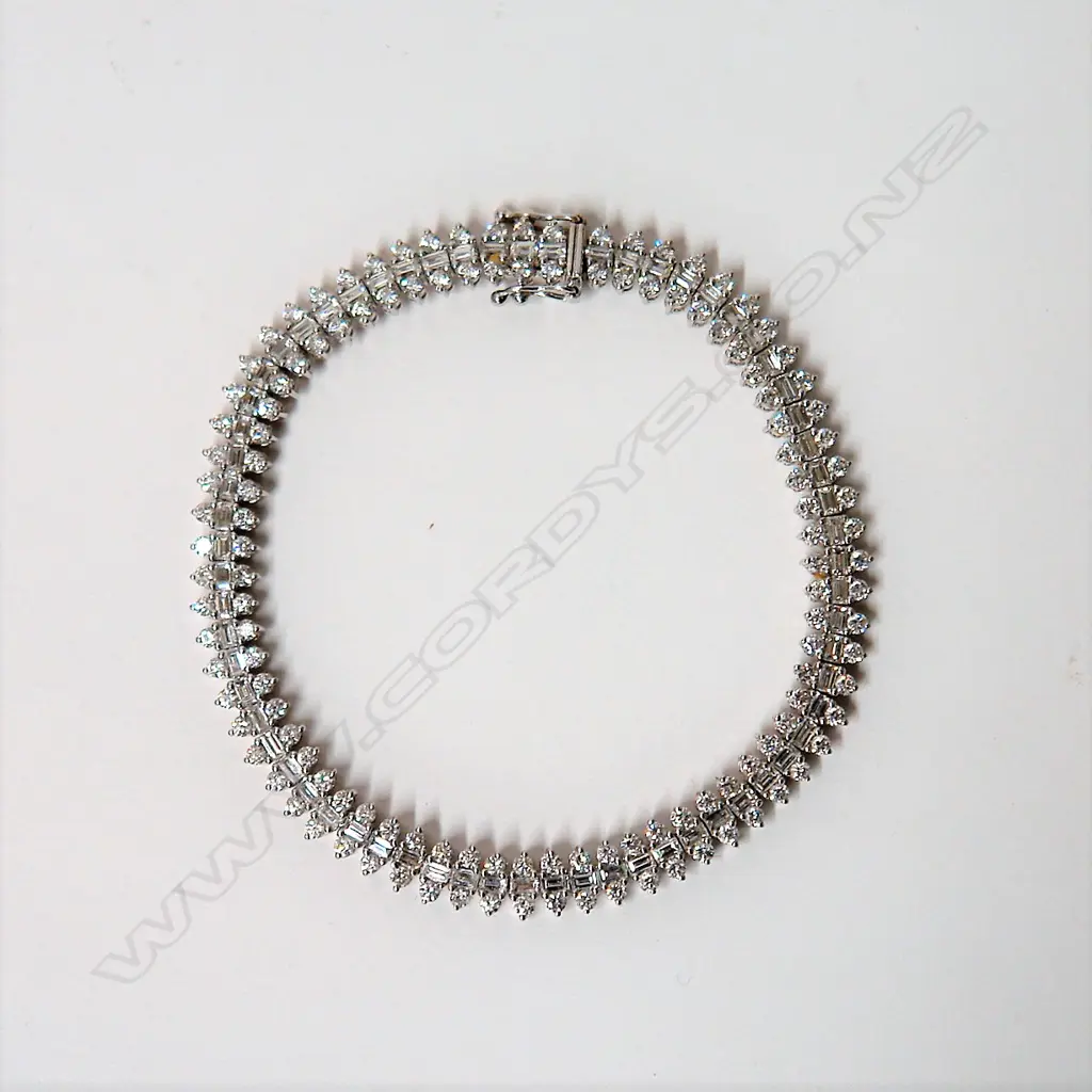 A modern 18ct. white gold and multi diamond bracelet Image 1++