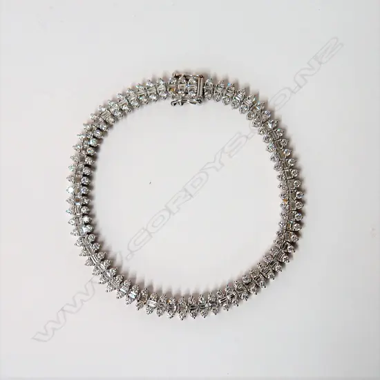 A modern 18ct. white gold and multi diamond bracelet