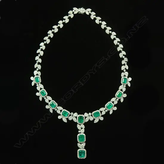 An impressive modern 18ct. white gold emerald and diamond necklace