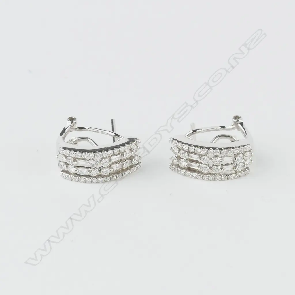 A pair of 18ct white gold and diamond earrings Image 1++