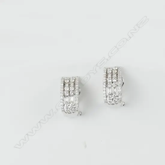 A pair of 18ct white gold and diamond earrings