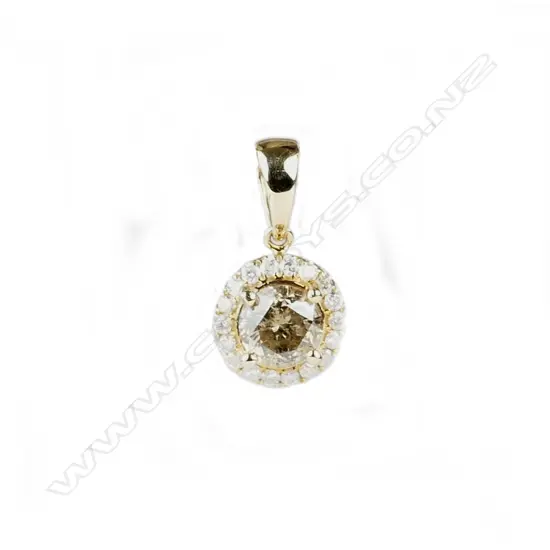 A 14ct. yellow gold and diamond pendant