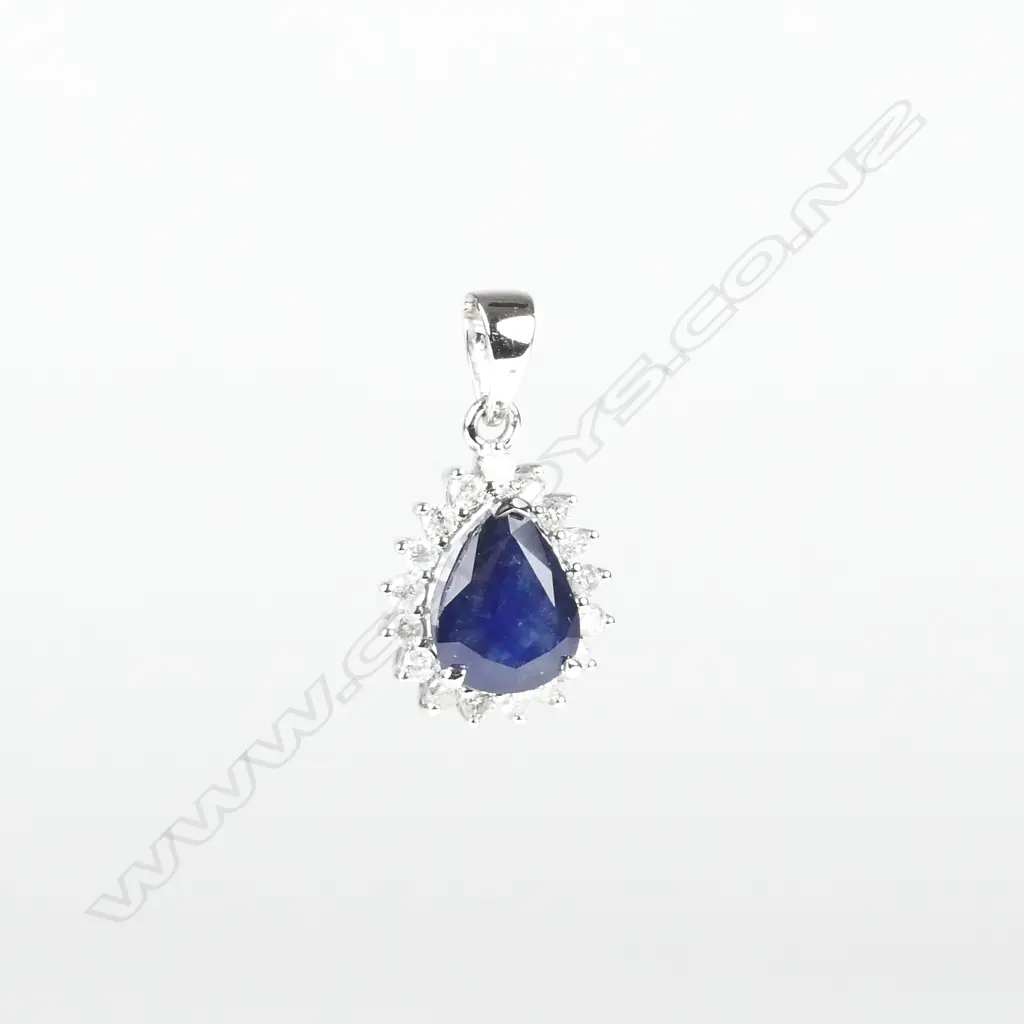 A 14ct. white gold sapphire and diamond pendant Image 1++