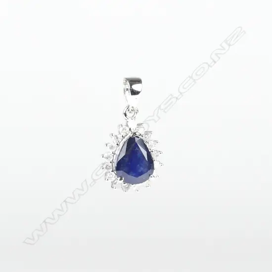 A 14ct. white gold sapphire and diamond pendant