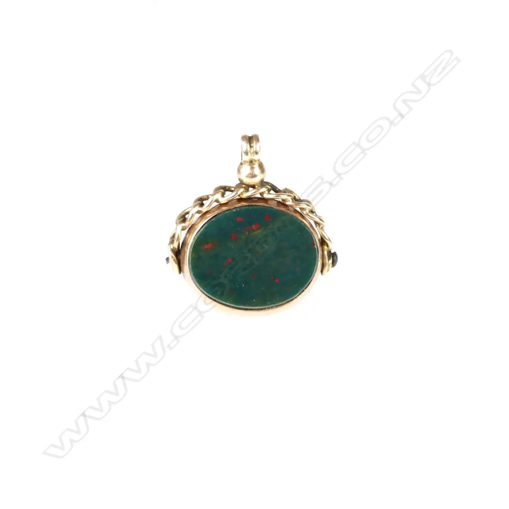 A 9ct. rose gold fob spinner Image 1++