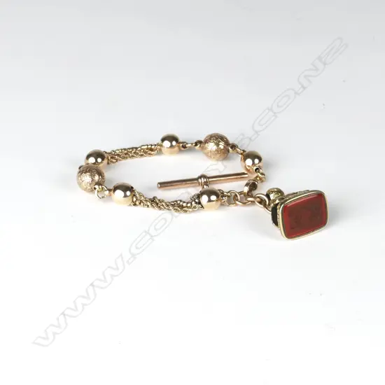 A 19thC 9ct. yellow gold Albertina chain bracelet with fob seal