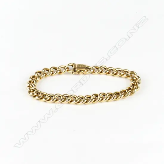 An 18ct. gold charm bracelet