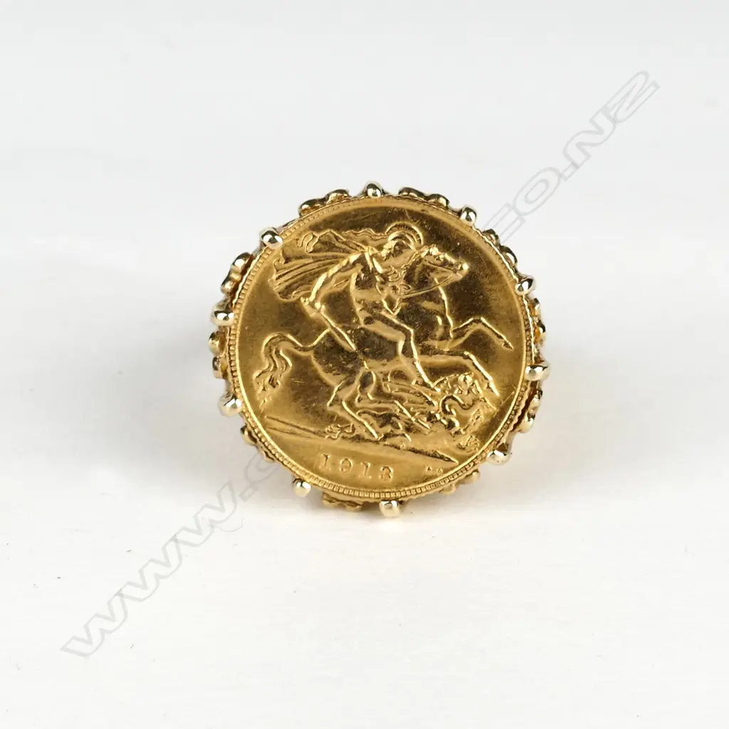A half sovereign ring Image 1++