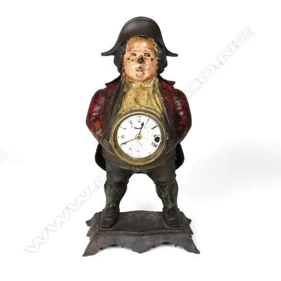 An American 19thC cast iron figural blinking eye clock