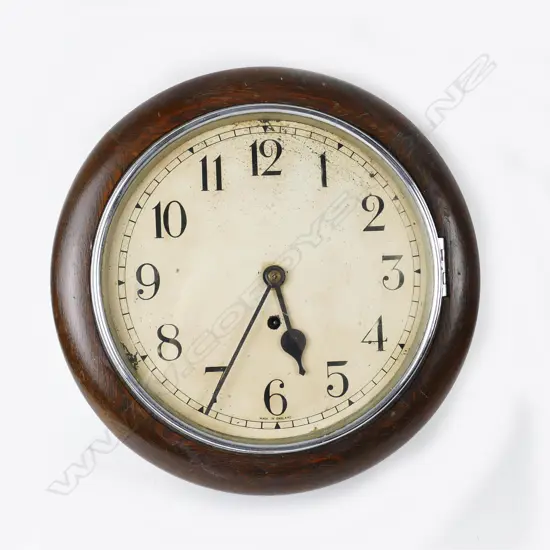 An English oak circular dial clock