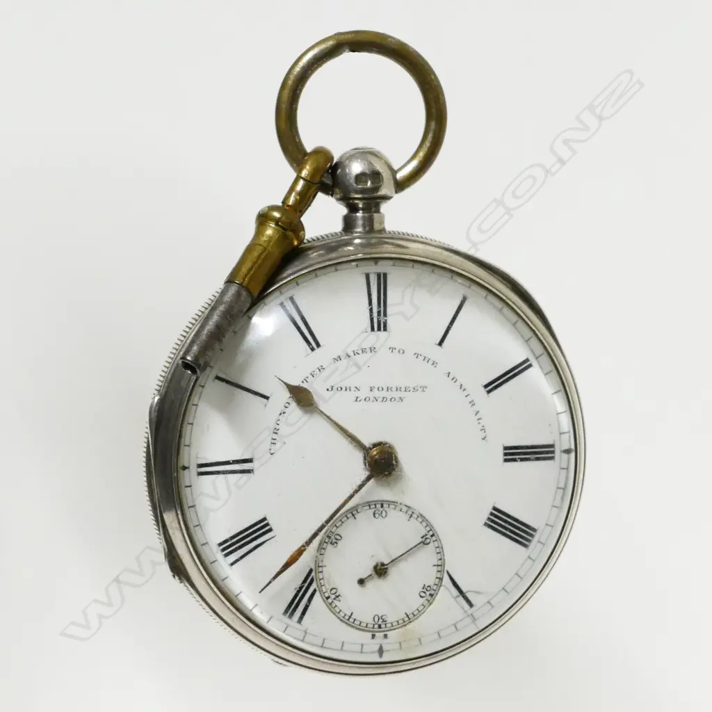 An open face silver pocket watch Image 1++