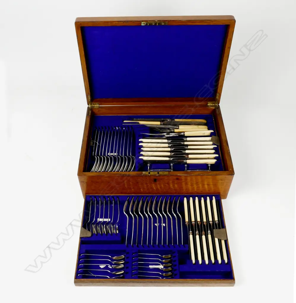 An oak cased canteen of sterling silver cutlery Image 1++