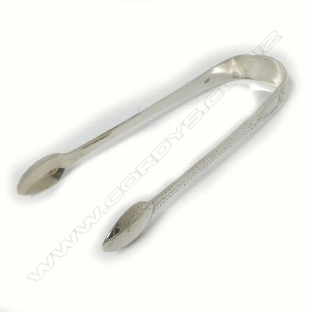 A pair of George III silver sugar tongs Image 1++