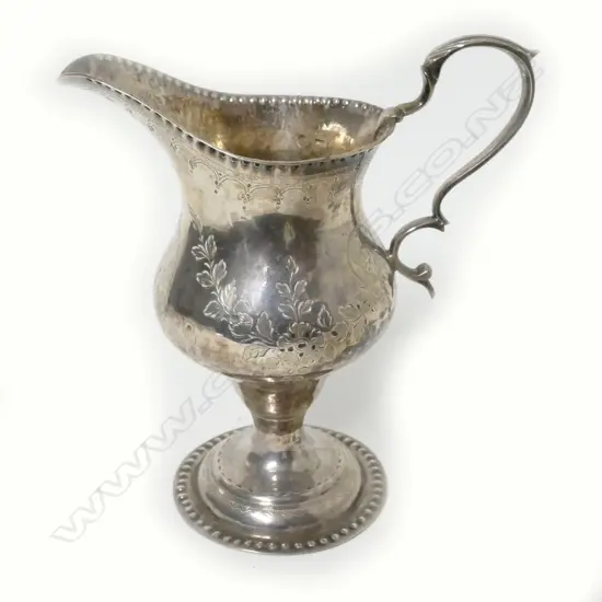 A George III silver helmet creamer