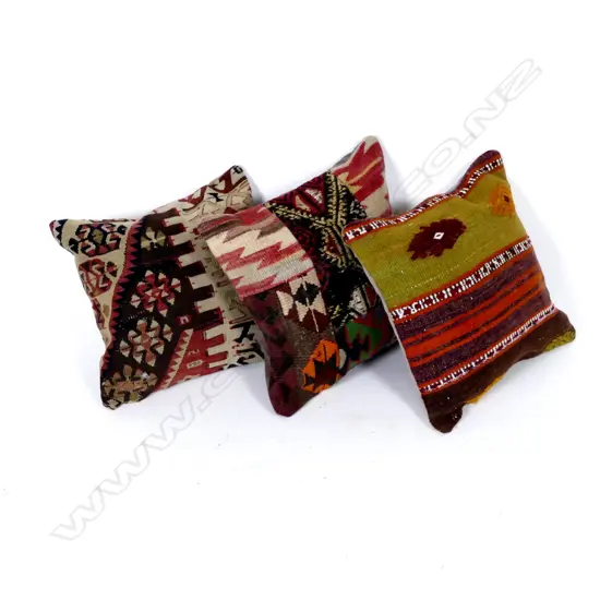 Three kilim cushions