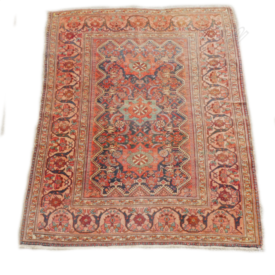An antique Persian Caucasian carpet