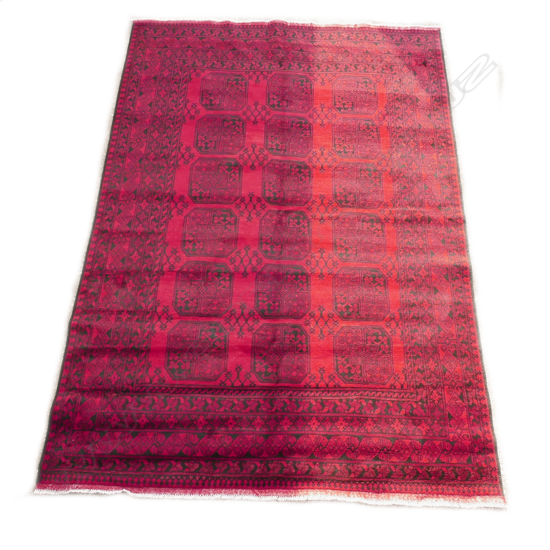 An Afghan 'Elephant's Foot' pattern hand knotted carpet