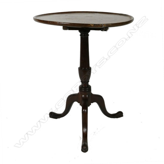 A Georgian oak tilt-top wine table