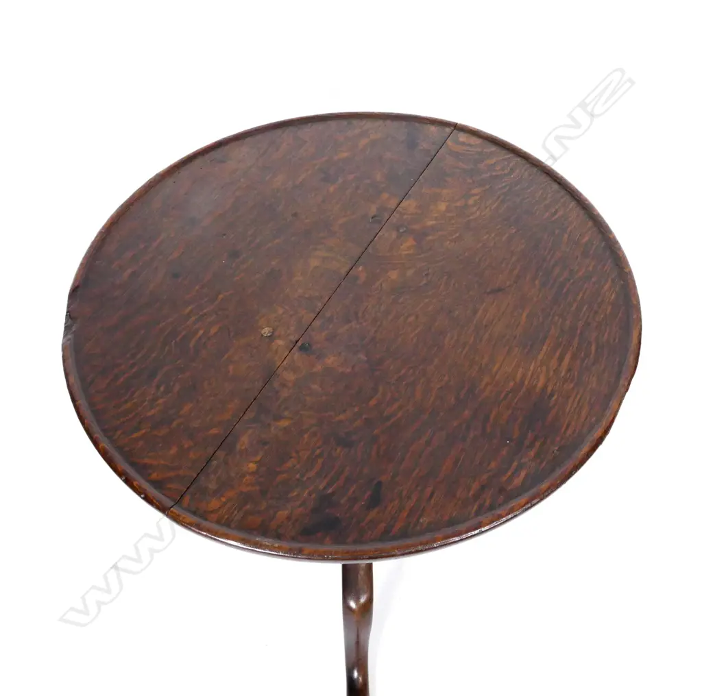 A Georgian oak tilt-top wine table Image 1++