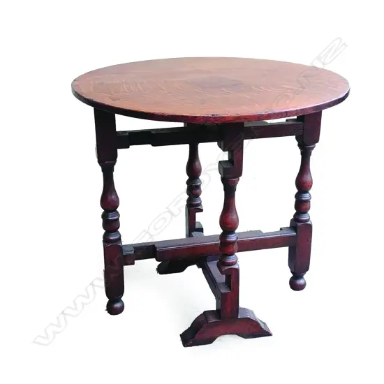A Georgian small oak gate leg folding table