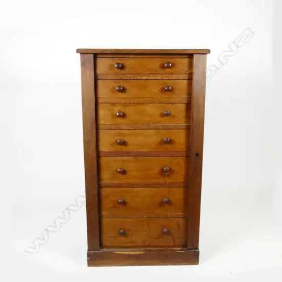 A vintage mahogany Wellington chest